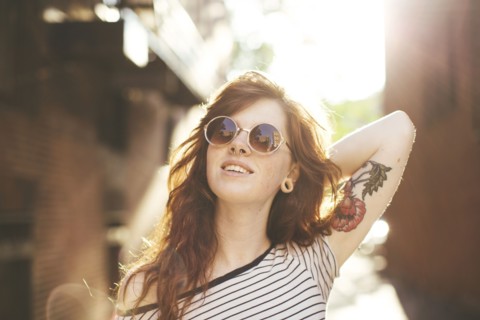 Caucasian woman posing in city