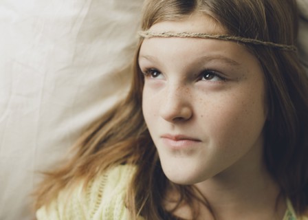 Caucasian girl wearing braid headband