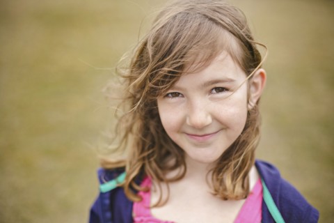 Close up of smiling Caucasian girl