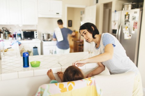 Caucasian family having breakfast in kitchen