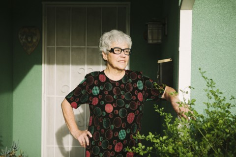 Woman standing at door