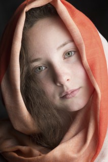 Close up of Caucasian girl wearing headscarf