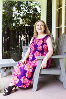 Caucasian woman sitting on porch
