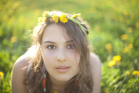 Caucasian woman wearing flowers in her hair