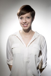 Smiling Caucasian woman wearing white shirt