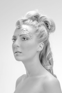 Close up of glamorous Caucasian woman looking up