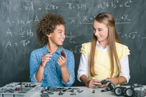 Students building vehicle in science class