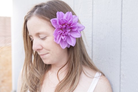 Mixed race woman wearing flower in her hair