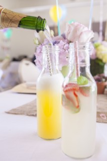 Soda and cocktails on party table