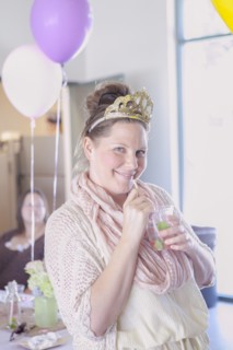 Caucasian woman drinking cocktail at party