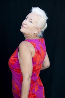 Rear view of smiling Caucasian woman