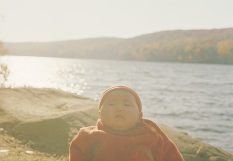Asian baby girl at remote lake
