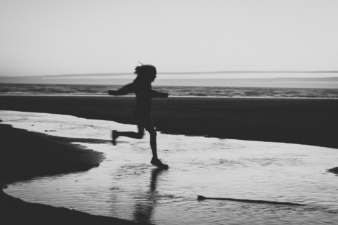 Girl running on beach