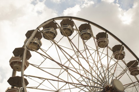 Low angle view of ferris wheel at amusement park