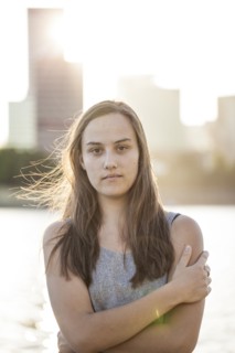 Serious woman with arms crossed