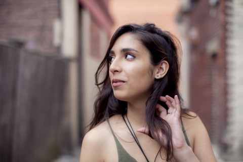 Mixed race woman in city