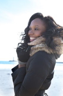 Close up of smiling woman wearing coat