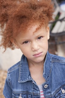 Close up of angry girl frowning