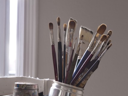 Close up of paintbrushes in jar