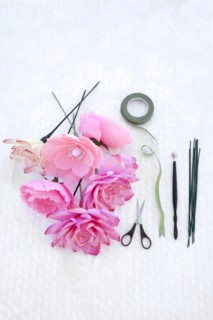 Fake flowers with tape and scissors