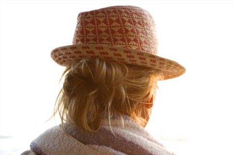 Rear view of woman wearing straw hat