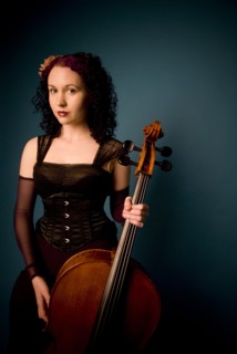 Serious musician holding cello