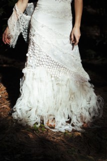 Bride wearing wedding gown in garden