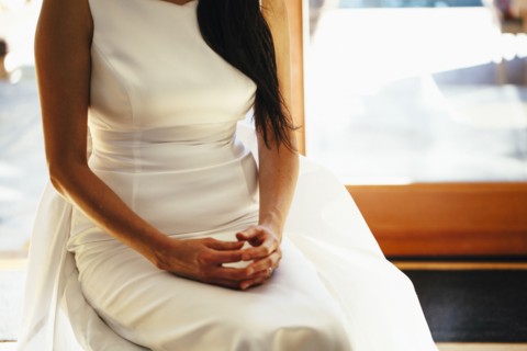 Close up of Korean bride sitting on bench