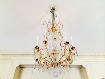 Low angle view of chandelier hanging from ceiling