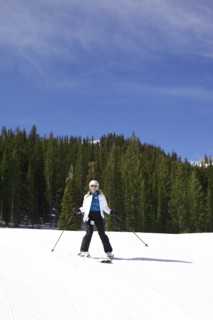 Woman skiing on snowy slope