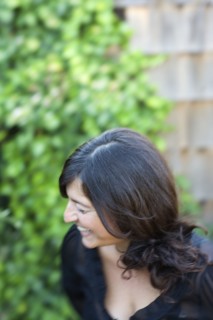 Close up of laughing woman in backyard