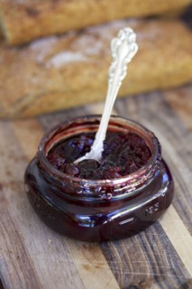 Close up of spoon in jar of jam