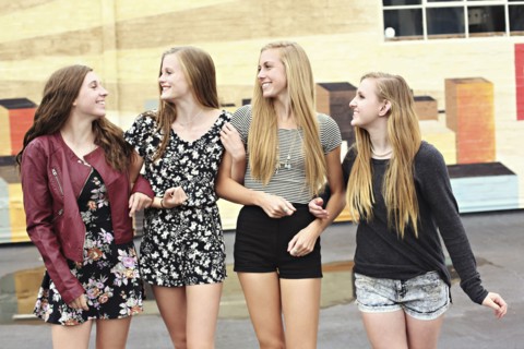 Teenage girls walking outdoors