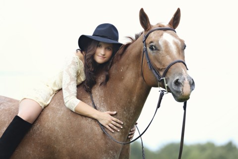 Woman riding horse