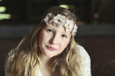 Close up of Caucasian girl wearing flower crown
