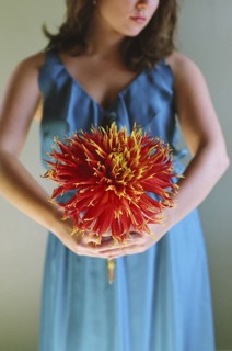 Close up of woman holding flower