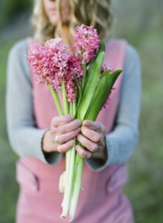 Close up of woman holding flower