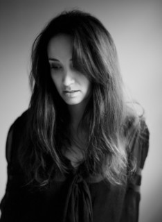 Close up of serious woman with long hair