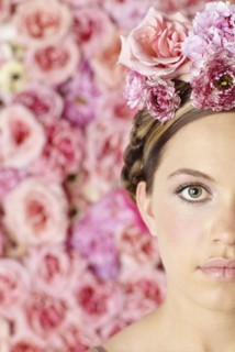 Serious woman wearing flowers in her hair