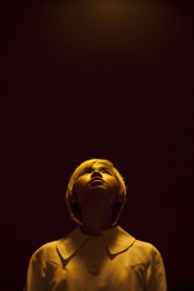Asian woman looking up
