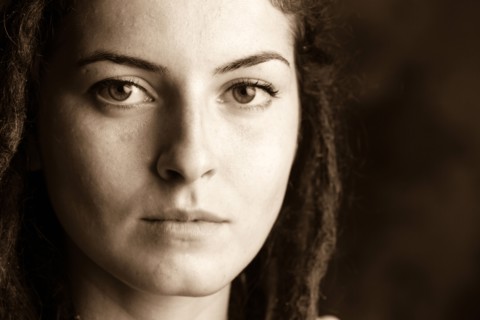 Close up of serious woman with dreadlocks