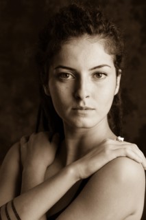 Close up of serious woman with dreadlocks