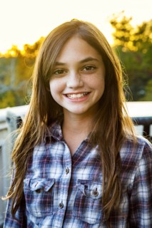 Close up of smiling Caucasian teenage girl