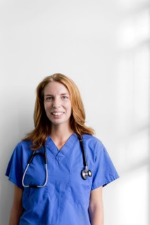 Smiling nurse wearing stethoscope