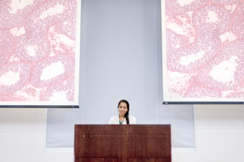 Armenian doctor speaking at podium