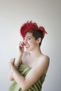 Caucasian woman wrapped in towel