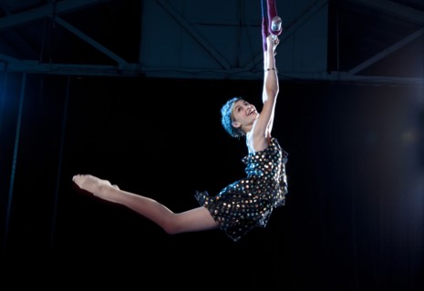 Mixed race acrobat performing