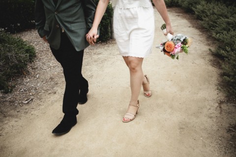 Japanese newlywed couple walking outdoors