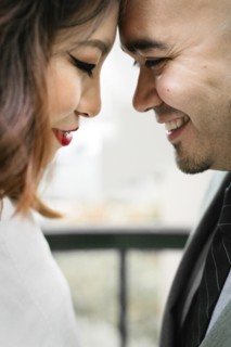 Japanese couple touching foreheads