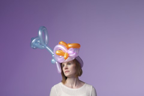Woman wearing balloon hat